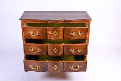Lot 106 - A French walnut chest of three long drawers,...