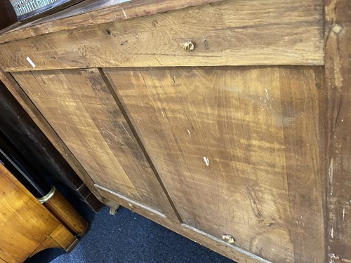 Lot 106 - A French walnut chest of three long drawers,...