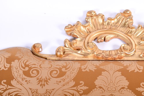 Lot 107 - A 20th century carved giltwood cushion-back...