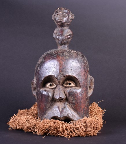 Lot 4 - A Bamum Janus mask, Cameroon, with kaolin...