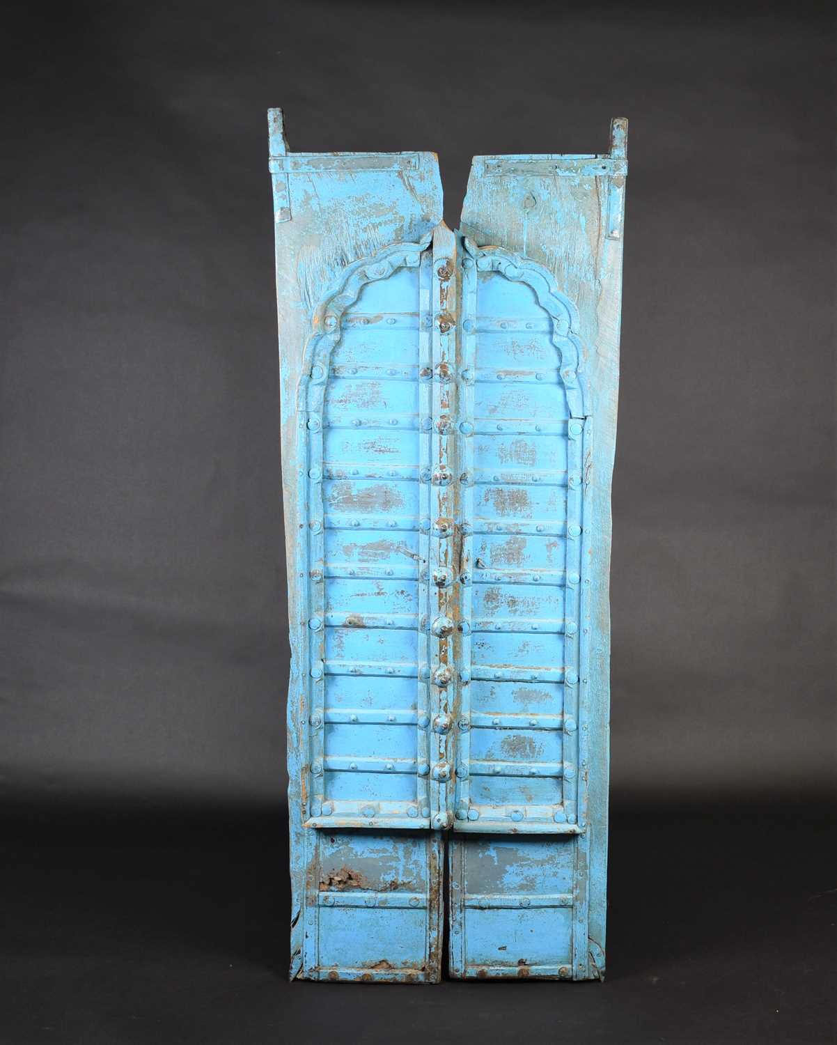 Lot 75 - A pair of North African painted wood window...