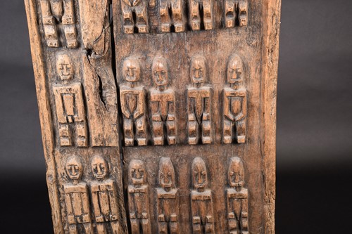 Lot 29 - A Dogon carved wood door, Mali, carved with...