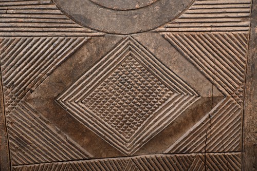 Lot 53 - An Igbo carved wood door, Nigeria, the...