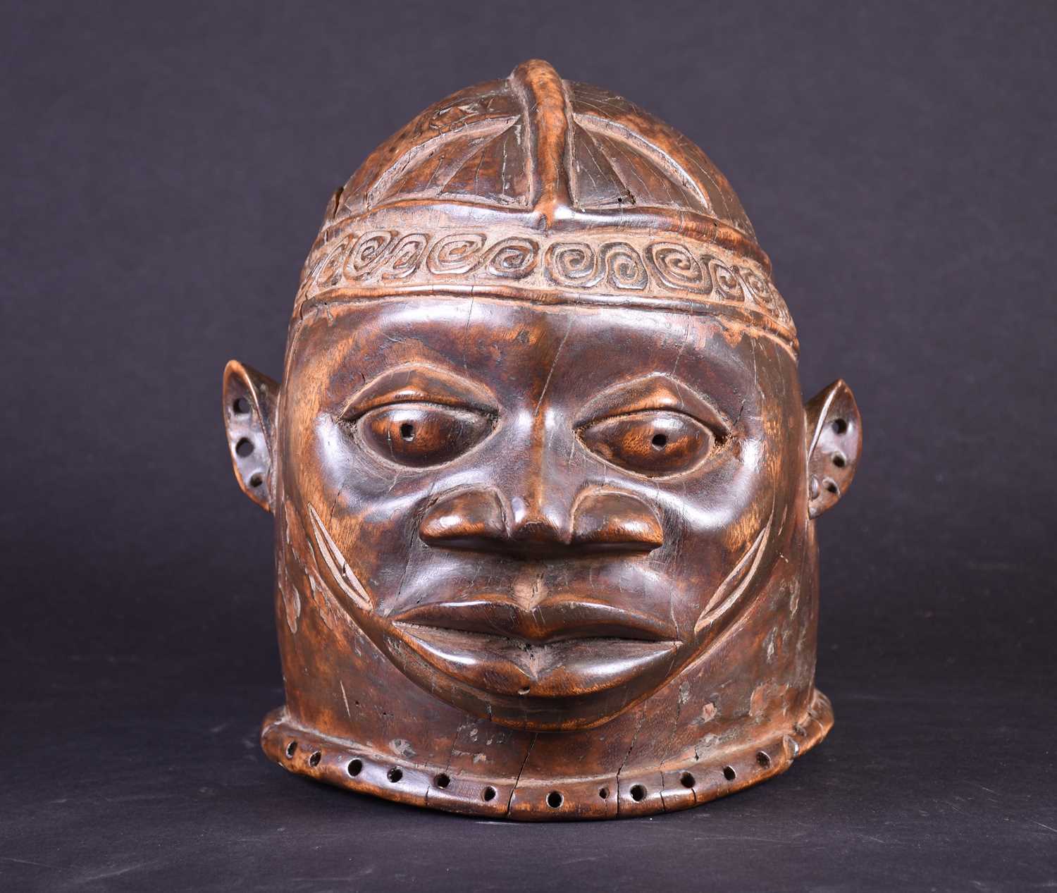 Lot 149 - A Makonde helmet mask, Mozambique, the scalp...