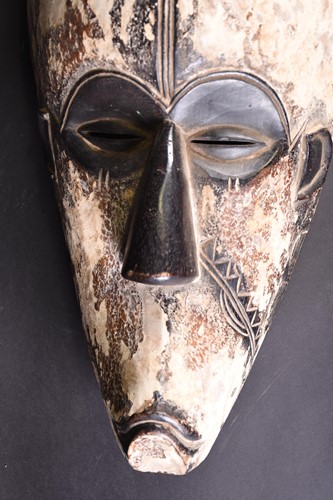 Lot 142 - A Fang mask, Gabon, the face with incised...