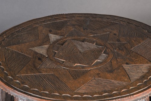 Lot 120 - A Nupe stool, Nigeria, the circular top with a...