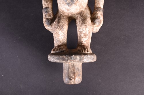 Lot 125 - A Punu Janus head standing figure, Gabon,...
