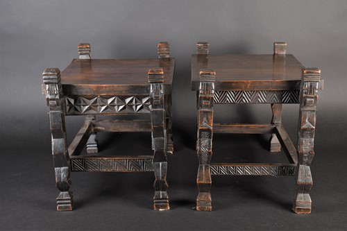 Lot 126 - A near pair of Rwandan carved wood stools,...