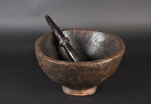 Lot 95 - A large African hand carved wood bowl, the...