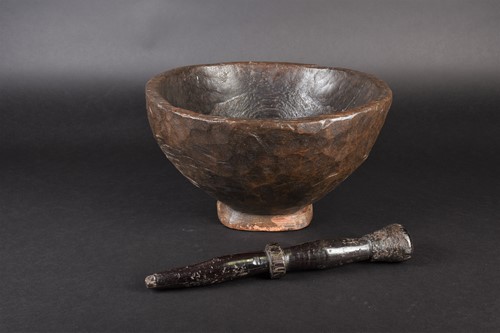 Lot 95 - A large African hand carved wood bowl, the...