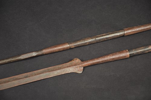 Lot 119 - Two Maasai lion spears, Kenya, iron with wood...