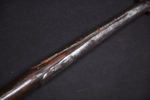 Lot 112 - An African long spear, the leaf shaped blade...