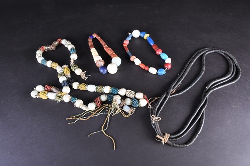 Lot 100 - African glass bead necklaces, comprising a...