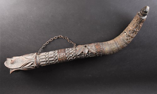Lot 134 - A large African carved wood and cow horn...