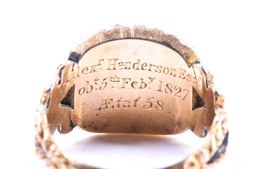 Lot 599 - A Georgian yellow gold mourning ring, with...