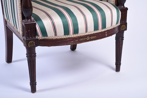 Lot 112 - A French Empire style armchair, the mahogany...