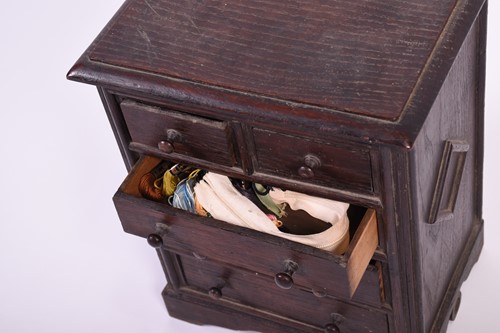 Lot 114 - A 19th century apprentice piece oak chest, the...