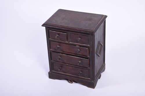 Lot 114 - A 19th century apprentice piece oak chest, the...