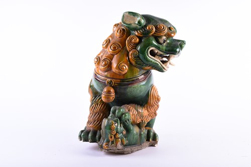 Lot 160 - A large Chinese sancai glaze temple lion, Qing,...