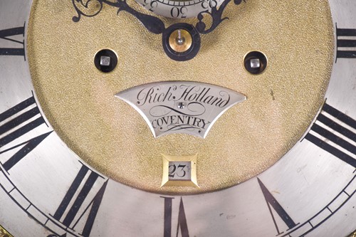 Lot 530 - A Georgian walnut long case clock, the arched...