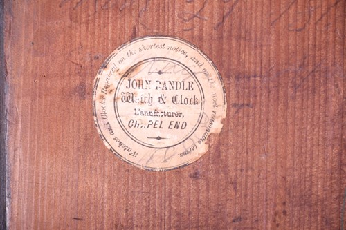 Lot 530 - A Georgian walnut long case clock, the arched...