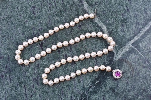 Lot 248 - A cultured pearl necklace, individually...