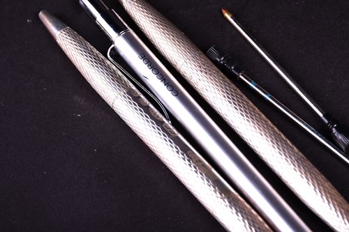 Lot 478 - A pair of silver double ended ballpoint pens,...