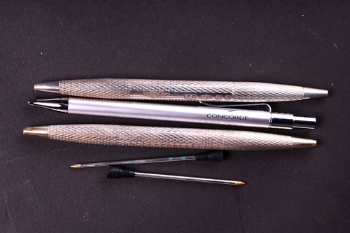 Lot 478 - A pair of silver double ended ballpoint pens,...