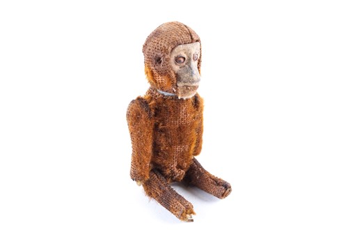 Lot 482 - An early 20th Schuco Monkey perfume bottle,...