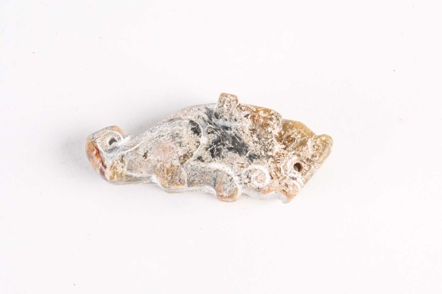 Lot 282 - A Chinese jade feline pendant, Han dynasty, of...