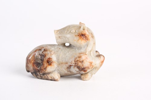 Lot 283 - A Chinese jade horse, Qing dynasty, carved...