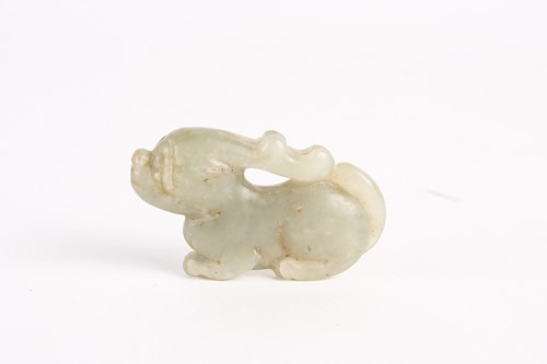 Lot 288 - A Chinese jade stag, Ming dynasty, in a...