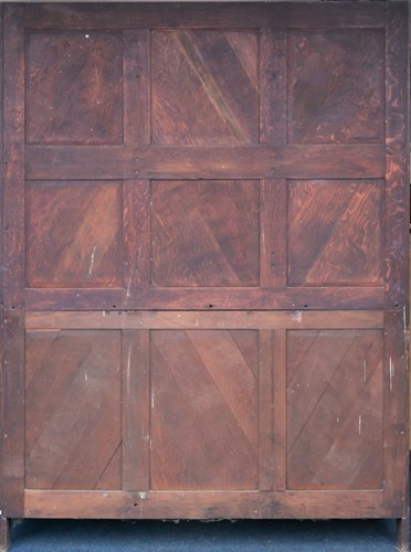 Lot 136 - An Arts & Crafts style quarter-sawn oak...