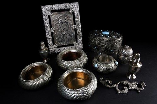 Lot 525 - A small collection of Eastern white metal...