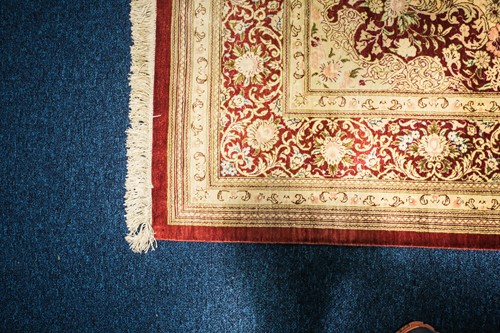 Lot 272 - A Qum rug of "Tabriz" style with central...