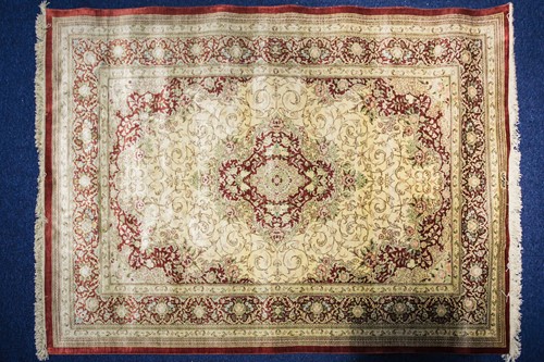 Lot 272 - A Qum rug of "Tabriz" style with central...