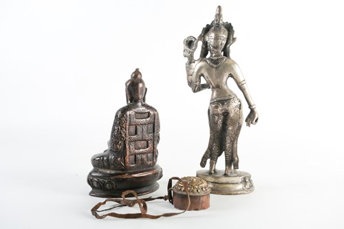 Lot 176 - A brown patinated bronze, seated Buddha on a...