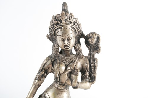 Lot 176 - A brown patinated bronze, seated Buddha on a...