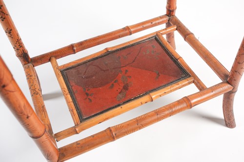 Lot 87 - A 19th century bamboo and painted lacquer fold-...