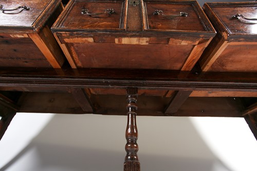 Lot 89 - A Charles II style oak dresser base with three...