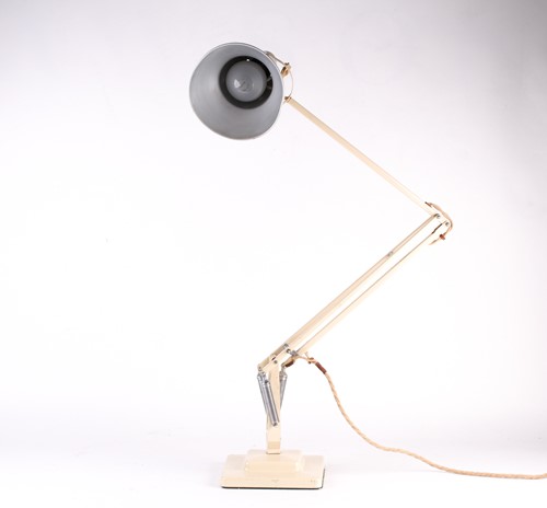 Lot 367 - A Herbert Terry angleoise lamp, in cream, on a...