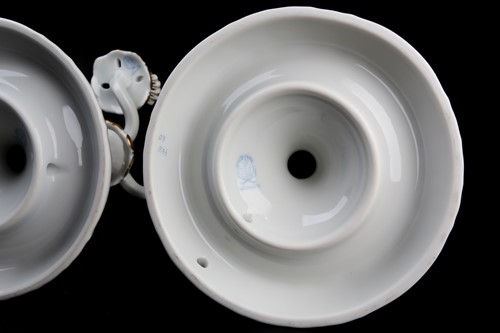 Lot 375 - A pair of Herend porcelain three-sconce...