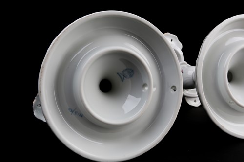 Lot 375 - A pair of Herend porcelain three-sconce...