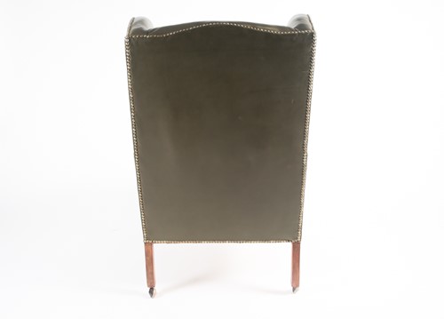 Lot 102 - A late 19th century green leather upholstered...