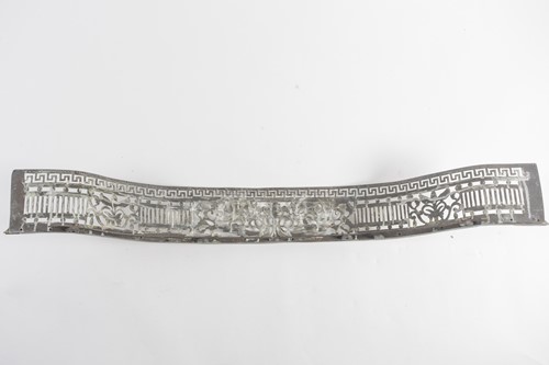 Lot 109 - A George III serpentine brass fender with...