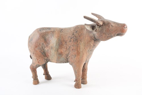 Lot 316 - A large carved teak wood bull, probably South...