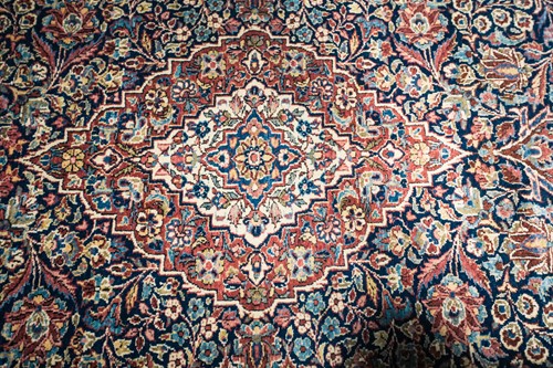 Lot 282 - A 20th century Kerman rug with "Bookcover"...