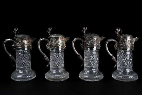 Lot 498 - A set of four 20th century silver...