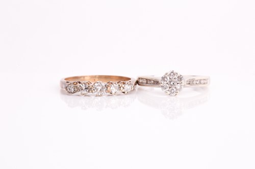Lot 362 - A diamond cluster ring, the seven round...