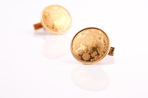 Lot 382 - A pair of coin cufflinks. Made from Austrian...